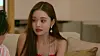 Song wearing counterfeit 'Van Cleef & Arpels' earrings on 'Single's Inferno.' [SCREEN CAPTURE]
