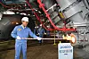 Posco’s CEO, Choi Jeong-woo, operates a newly innovated smart shaft furnace. [POSCO]