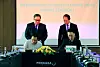 Le Anh Son, left in the front row, CEO of Vietnam's Phenikaa, and Kim Hyo, right, head of Naver Whale team, sign a memorandum of understanding at Phenikaa University in Hanoi on Friday. [NAVER]