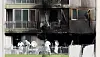 Police and firefighters inspect Wednesday the scene of a fire at an apartment building in Gunpo, Gyeonggi, which led to 11 casualties including four deaths. [NEWS1]