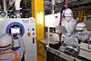 LG Display workers check equipment designed to capture carbon emissions. [LG DISPLAY]