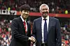 Manchester United former player Park Ji-sung, left, shakes hands with former manager Alex Ferguson as Park is introduced as a new ambassador for the club before the team's English Premier League match against Everton at Old Trafford Stadium in Manchester, England in 2014. [AP/YONHAP]