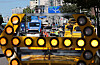 Road authorities control traffic in Yeonhui-dong in Seodaemun District, western Seoul on Friday morning after additional road subsidence was discovered near a sinkhole that appeared a day earlier. [YONHAP]