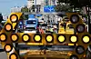 Road authorities control traffic in Yeonhui-dong in Seodaemun District, western Seoul on Friday morning after additional road subsidence was discovered near a sinkhole that appeared a day earlier. [YONHAP]