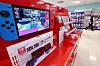 Nintendo Switch consoles are stacked up at a supermarket in Seoul on Thursday. The Nintendo Switch has been enjoying a boost in popularity in Korea during the Covid-19 pandemic. According to its local distributor Daewon Media, the portable game console sold 90,964 units during the second quarter, up 106.4 percent on year. [YONHAP]