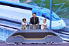 President Yoon Suk Yeol, center, attends a ceremony alongside children and officials to mark the 20th anniversary of KTX rail service at the Korea Railroad Corp headquarters in Daejeon on Monday. He highlighted that the next-generation KTX-Cheongnyong express train, the fastest of its kind in the country, which was unveiled on this day, will enter into service next month to help shorten travel times. [JOINT PRESS CORPS]