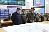 In this photo released on Thursday by Pyongyang's state-controlled Korean Central News Agency, regime leader Kim Jong-un reviews the North's war plans during his visit to a command post of the Korean People's Army on Tuesday. [YONHAP]