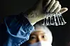 An SK Bioscience researcher conducts tests to develop a Covid-19 vaccine at the company's lab. [SK BIOSCIENCE]
