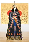 Traditional Korean garments for a queen from Joseon Dynasty (1392-1910) featured in front of artwork by Kim Byung-jong at Kim Byung Jong Art Museum. [JANG JUNG-PIL]