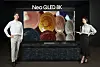 Models pose with Samsung Electronics' Neo QLED 8K television. [SAMSUNG ELECTRONICS]