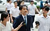 Former Justice Minister Cho Kuk on Monday arrives at the High Court in Seocho-dong, Seoul, to attend his first appeal against an earlier ruling. Earlier this year he was sentenced to two years related to false documents and certificates that were used in his children getting admitted to college, medical school and graduate school. [YONHAP]