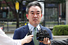 Deputy Police Commissioner General Yoon Hee-geun, who is Interior Minister Lee Sang-min's nominee to fill the top post at the National Police Agency, is approached by reporters outside the agency's headquarters in Seodaemun District, central Seoul on Tuesday. [NEWS1]
