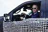U.S. President Joe Biden stops to talk to the media as he drives a Ford F-150 Lightning truck at Ford Dearborn Development Center, Tuesday, May 18, 2021, in Dearborn, Michigan. [AP/YONHAP]