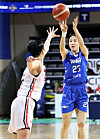 Kim Dan-bi of the Asan Woori Bank Woori Won, right, shoots during a WKBL Championship game against Busan BNK Sum at Yi Sun-sin Icerink Gymnasium in Asan, South Chungcheong on Sunday. [NEWS1]