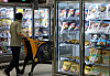 A customer shops for food at a discount store in Seoul on Tuesday. [NEWS1]