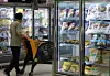 A customer shops for food at a discount store in Seoul on Tuesday. [NEWS1]