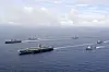 In this photo provided by Korea's Defense Ministry, the U.S. nuclear-powered aircraft carrier USS Ronald Reagan, second from left, and South Korea's landing platform helicopter ship Marado, left, sail during a joint military exercise at an undisclosed location on June 4. [AP/YONHAP]