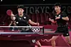 Korea's Jeong Young-sik, left, and Lee Sang-su compete during the table tennis men's team semifinal match against China's Xu Xin and Ma Long at the 2020 Tokyo Olympics in Tokyo on Wednesday. [AP/YONHAP]