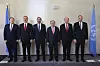 Left to right, Minister of State of the United Kingdom for Europe and North America Stephen Doughty, Turkish Foreign Minister Hakan Fidan, Cyprus President Nikos Christodoulides, UN Secretary-General Antonio Guterres, Turkish Cypriot leader Ersin Tatar and Greek Minister of Foreign Affairs Giorgos Gerapetritis stand for a group photo in Geneva, Switzerland, on March 18. [EPA/POOL/YONHAP]