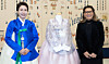First lady Kim Hea Kyung, left, poses for a photo with Brazilian first lady Rosângela Lula da Silva, the wife of Brazilian President Luiz Inácio Lula da Silva, after presenting her with a custom-made 'hanbok,' or Korean traditional attire, at the Blue House in central Seoul on Feb. 23. [JOINT PRESS CORPS]