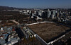 A view of Jongmyo Shrine in central Seoul and the adjacent ″Sewoon District 4″ redevelopment area [YONHAP]