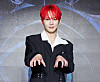 SHINee's Key poses for photos during a press conference ahead of the release of his third full-length album, ″Hunter,″ in eastern Seoul on Aug. 11. [SM ENTERTAINMENT]