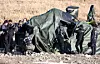 Military authorities are seen inspecting the site of a helicopter crash that killed two warrant officers in Gapyeong, Gyeonggi on Feb. 9. [NEWS1]