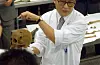 Forensic investigators from Kyungpook National University share their findings after examining the remains of the Frog Boys on Sept. 28, 2002. [JOONGANG ILBO]