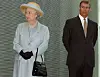 The late Queen Elizabeth II stands next to her son Andrew Mountbatten-Windsor as they listen to speeches during a visit to Imperial College in London on June 24, 2004. [AP/YONHAP]