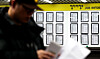Job seekers check an employment notice bulletin board at a job fair in Mapo District, western Seoul, on Feb. 21. [NEWS1]
