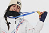 Choi Ga-on of Korea celebrates on the podium after winning the gold medal in the women's halfpipe snowboarding event at the Winter Olympics at Livigno Snow Park in Livigno, Italy, on Feb. 12.  [YONHAP]