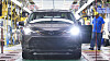 A Toyota Motor worker makes a car at its manufacturing factory in Indiana. [TOYOTA MOTOR USA]