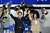 Lee Jae-myung of the liberal Democratic Party, left, and his wife Kim Hye-kyung wave to his supporters at an outdoor stage near the National Assembly in Yeouido, western Seoul, in the early hours of June 4. [KIM SEONG-RYONG]