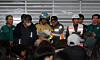 Fire authorities read out the names of identified victims of the Jeju Air plane crash at Muan International Airport on Dec. 29. [YONHAP]