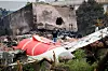 A fire officer stands next to the crashed Air India Boeing 787-8 Dreamliner aircraft, in Ahmedabad, India, on June 13. [REUTERS/YONHAP]