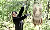 Figure skater Kim Chae-yeon strikes a pose for a photo while pointing to a costume handmade by her mother at Taereung International Skating Rink in Nowon District, northern Seoul, on April 28. [KIM SEONG-RYONG]