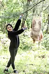 Figure skater Kim Chae-yeon strikes a pose next to a costume handmade by her mother at Taereung International Skating Rink in Nowon District, northern Seoul, on April 28. [KIM SEONG-RYONG]