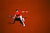 Serbia's Novak Djokovic delivers a forehand return to Britain's Cameron Norrie during their men's singles match on day 9 of the French Open on Court Philippe Chatrier at Roland Garros in Paris on June 2, 2025. [AFP/YONHAP]