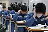 Juvenile inmates take the college entrance exam as Mandela School ...