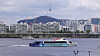 A Hangang Bus departs Yeouido for Ttukseom in eastern Seoul during a trial run on July 1. [NEWS1]