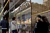 People walk past a Louis Vuitton store in Tsim Sha Tsui, a bustling shopping hotspot, in Hong Kong on Dec. 5, 2023. [REUTERS/YONHAP]