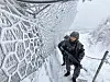 Soldiers of the 21st Infantry Division patrol the barbed wire fence along Mount Gachilbong in Yanggu County, Gangwon, on Dec. 12, 2023. [YONHAP]
