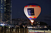 A hot air balloon to promote Busan's bid to host the 2030 World Expo floats at Haeundae beach in Busan on Saturday. [YONHAP]