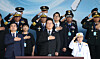 South Korean President Lee Jae Myung, center, pledges allegiance to the country's flag during a ceremony to mark the 77th Armed Forces Day in Gyeryong, South Chungcheong, on Oct. 1. [JOINT PRESS CORPS]