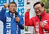 Progressive candidate Chung Geun-sik, left, campaigns for the Seoul education superintendent race on Oct. 15, 2024, a day before the Oct. 16 by-elections. On the same day, conservative candidate Cho Jun-hyuk appeals for voter support near Amsa Station in Gangdong District, Seoul. [NEWS1, YONHAP]