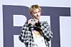 Cortis’s Martin poses for photos during a showcase for the release of the band’s first EP, ″Color Outside the Lines,″ at the Blue Square in central Seoul on Aug. 18. [DANIELA GONZALEZ PEREZ]
