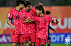 Korea's Yun Do-yong, right, celebrates during an AFC U-20 quarterfinal against Thailand in China on Feb. 17. [YONHAP]