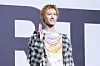 Cortis’s Martin poses for photos during a showcase for the release of the band’s first EP, ″Color Outside the Lines,″ at the Blue Square in central Seoul on Aug. 18. [DANIELA GONZALEZ PEREZ]