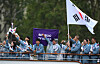 South Korean athletes participate in the floating parade on the Seine during the Opening Ceremony of the Paris Olympics on Friday in Paris. [REUTERS/YONHAP]