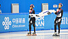 Park Ji-won, left, and Jang Seong-woo celebrate winning silver and bronze medals, respectively, in the short track men's 500-meter final at the Asian Winter Games in Harbin, China, on Feb. 8. [YONHAP]